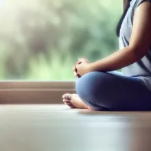 An image of a person practicing deep-breathing exercises.